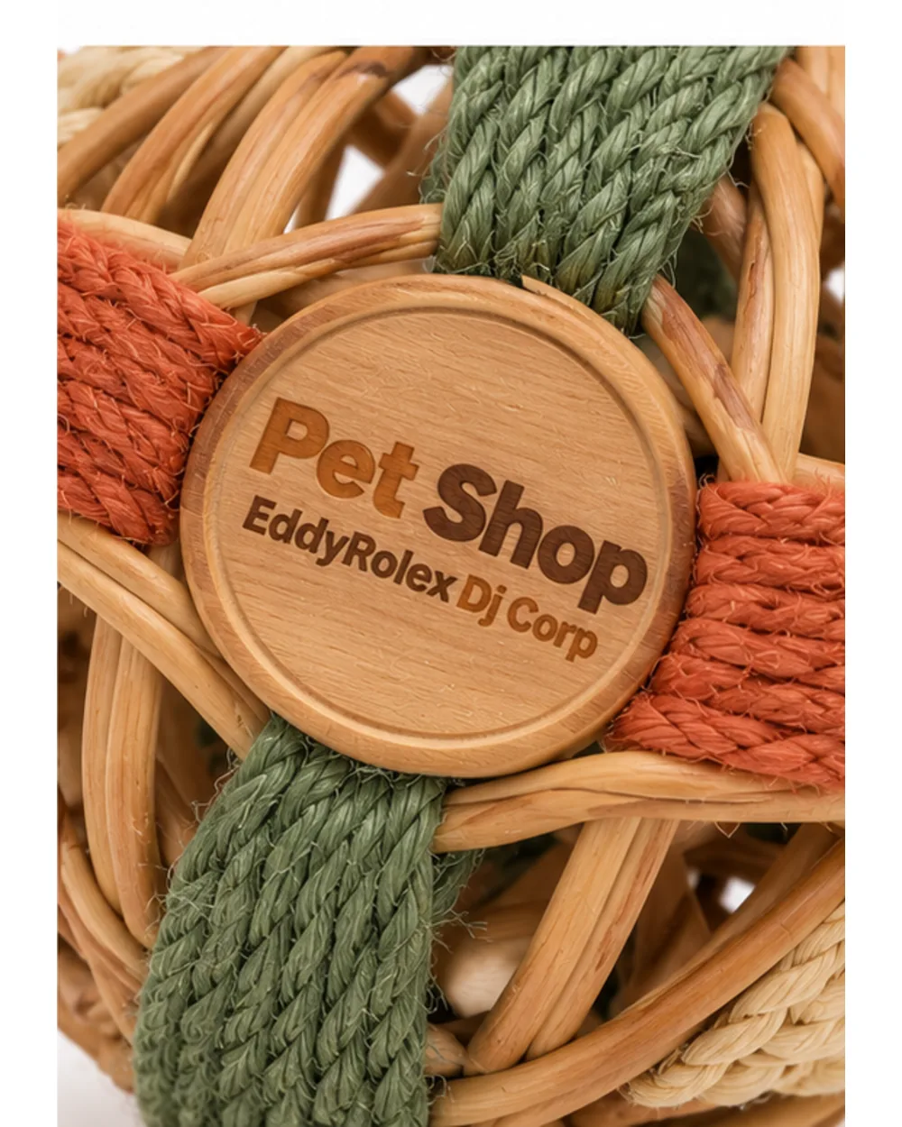 Close-up of the Pet Shop EddyRolex DJ Corp logo engraved into the wooden center disc